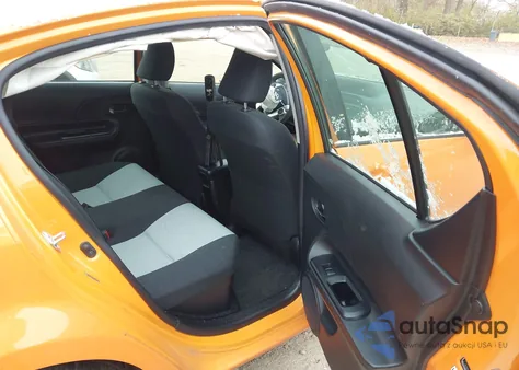 2015 Toyota Prius C Two from USA, damaged, VIN JTDKDTB33F1091239